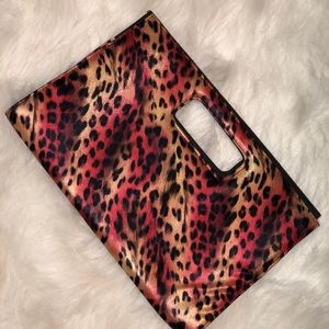 Red, creme and gold multi color clutch